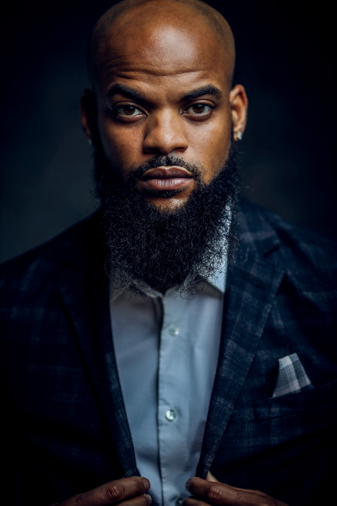 Man with a full, carefully groomed beard